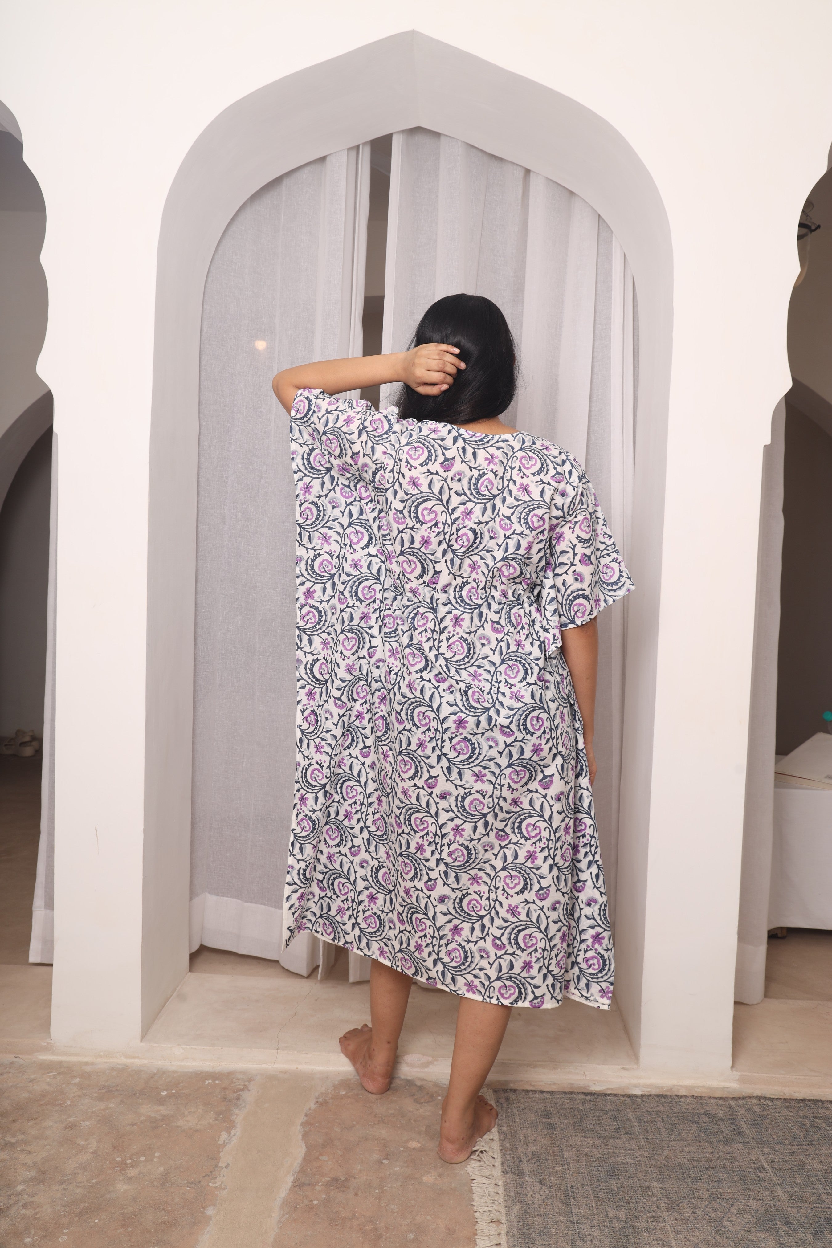 woman wearing purple floral cotton kaftan relaxed fit